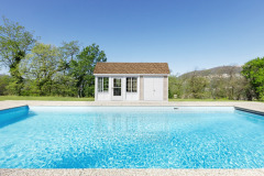 Outside of modern house in summer, swimming pool